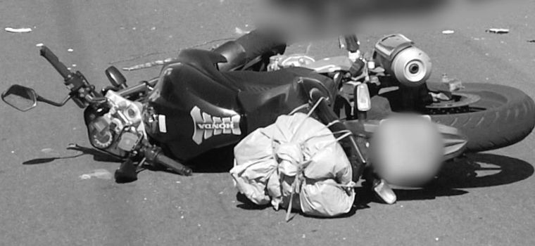 Motociclista morre após cair embaixo de caminhão na Perimetral